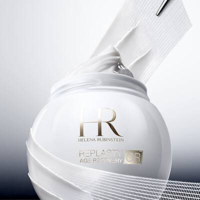 Helena Rubinstein Replasty Age Recovery GR cream jar with a rich white cream texture being lifted.