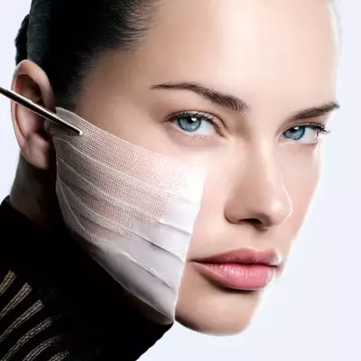 Dermatologist Dr. Anny Cohen-Letessier alongside scientific cellular network bubbles by Helena Rubinstein.