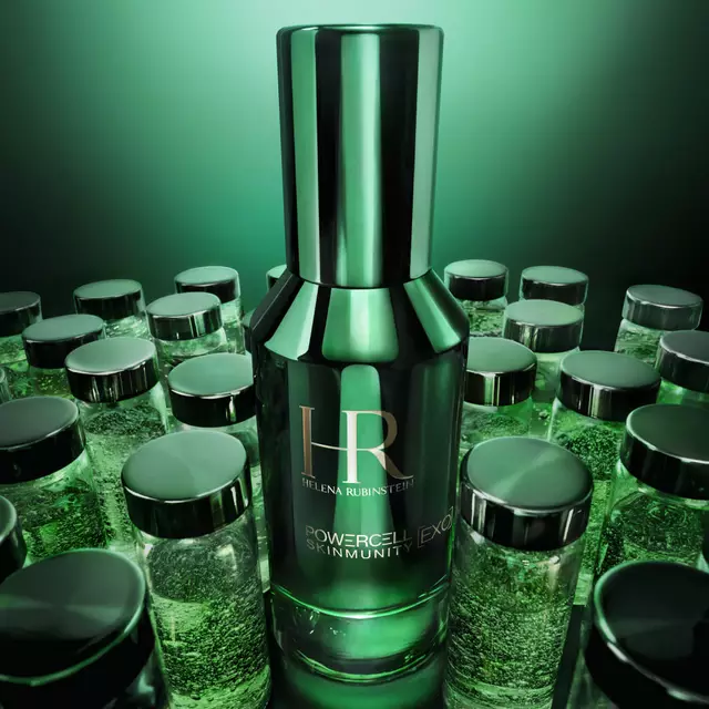 Helena Rubinstein Powercell Skinmunity [EXO] serum bottle surrounded by lab vials with green skin-rejuvenating formula