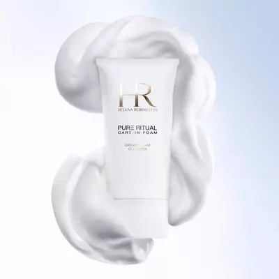 Pure Ritual Care-in-Foam cleanser enveloped in a dense creamy lather for gentle purifying luxury skincare.