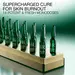 14 green Powercell Skinmunity EXO monodose ampoules on a luxury gold base.